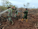 Kapten Inf Syuar Hendri Kembali Memimpin Pelaksanaan Pemadaman dan Pendinginan Hutan