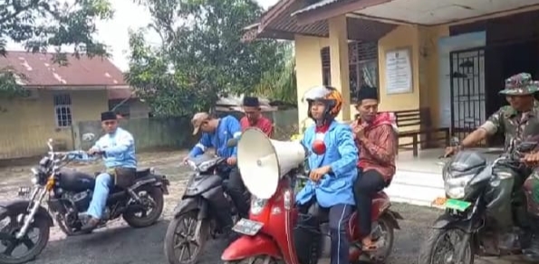 Sertu Ramli Himbau Masyarakat Pasang Bendera Merah Putih di Rumah