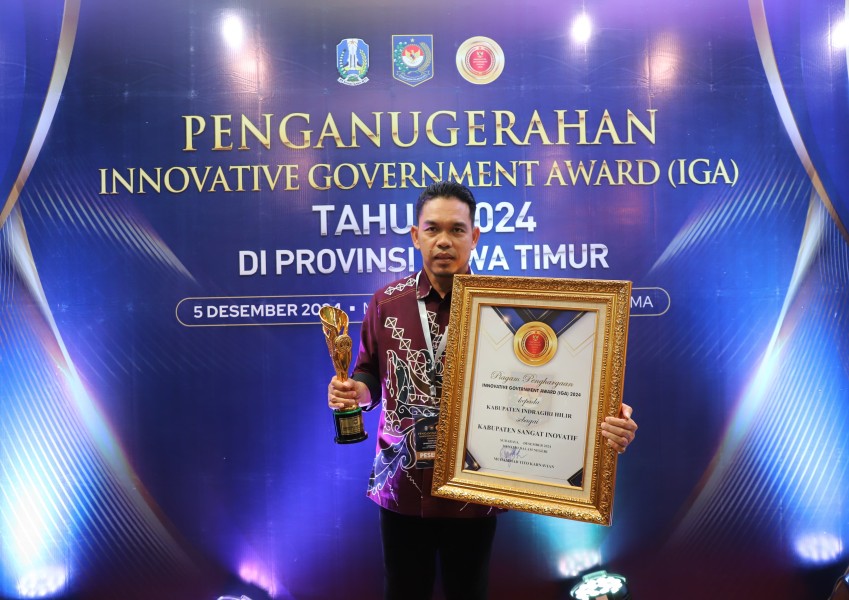 Pj Bupati Erisman Yahya Terima Penghargaan Kabupaten Sangat Inovatif di IGA 2024