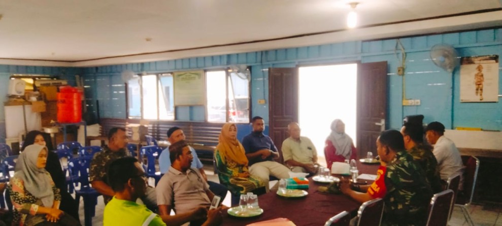 Rapat Bulanan Kelurahan Pelintung, Babinsa Tekankan Pentingnya Keamanan Lingkungan