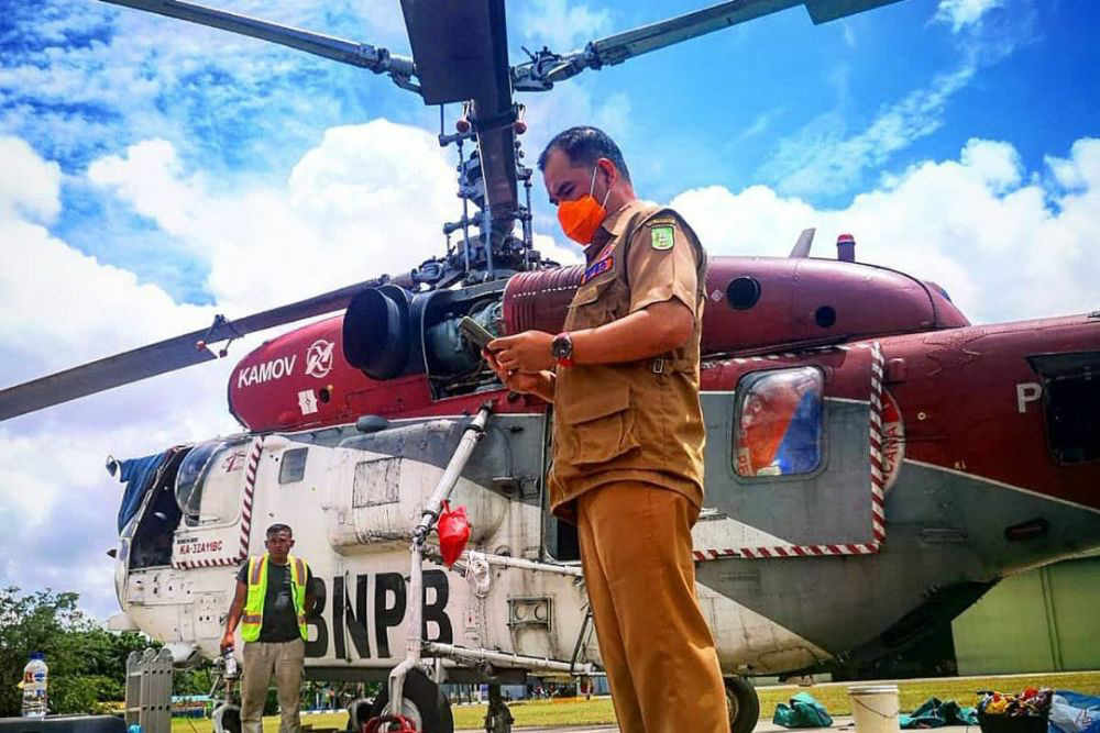 BNPB Tarik Bantuan Helikopter dari Riau