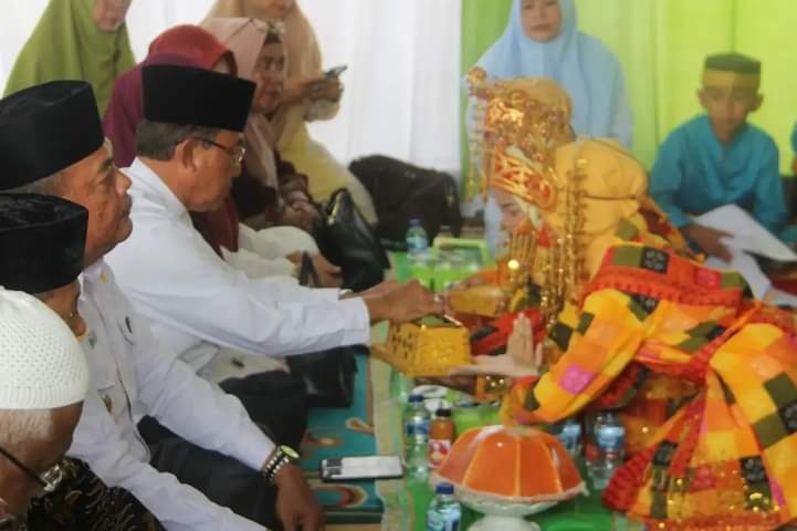 Saat Maulid Nabi di Desa Tanah Merah, Bupati HM Wardan Ajak Masyarakat Bersama-sama membangun Negeri